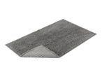 A gray bath mat with a textured surface is shown at a slight angle.