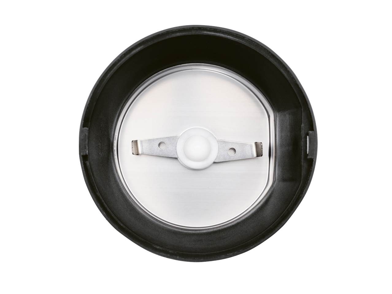 Top-down view of a coffee grinder's interior with a two-pronged blade.