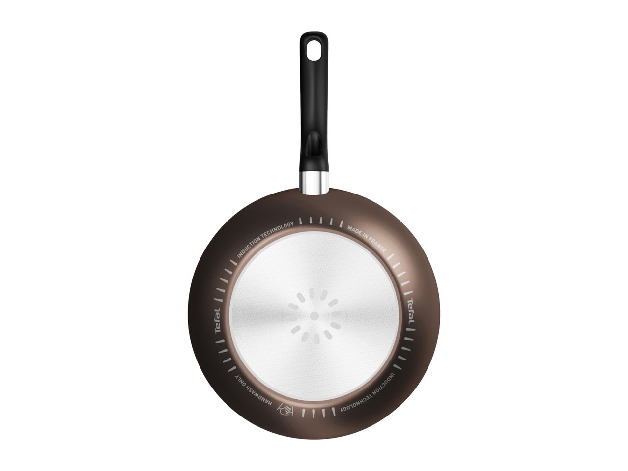 Bottom view of a frying pan with a black handle, showing induction technology and handwash only text.