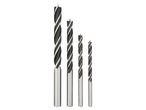 A set of four Forstner drill bits of varying sizes.