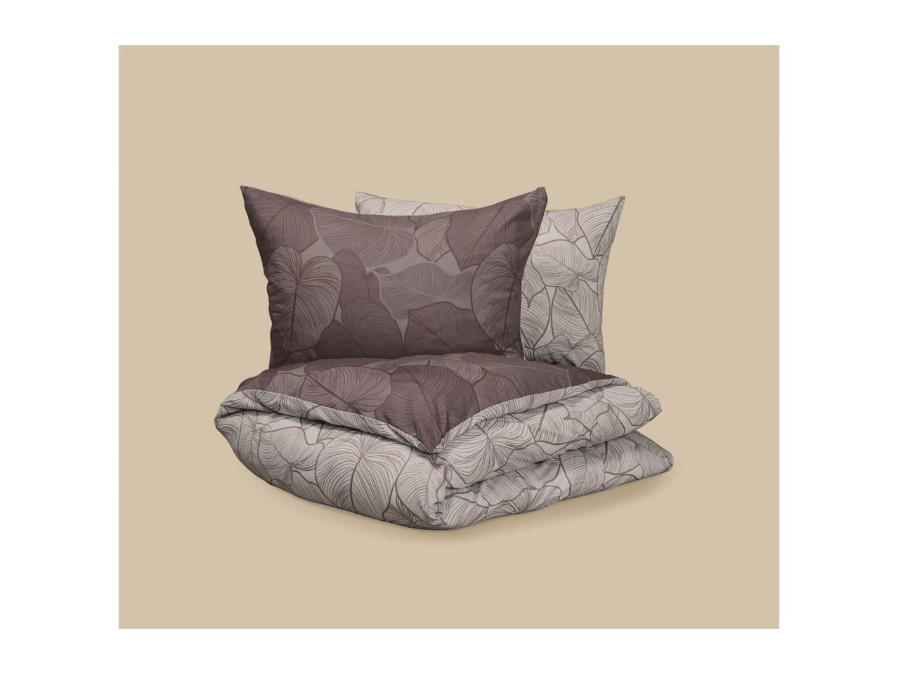 Reversible bedding set with a leaf pattern, featuring a duvet cover and two pillows