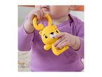 Baby in a purple onesie holding a yellow bear-shaped rattle with a clear belly.