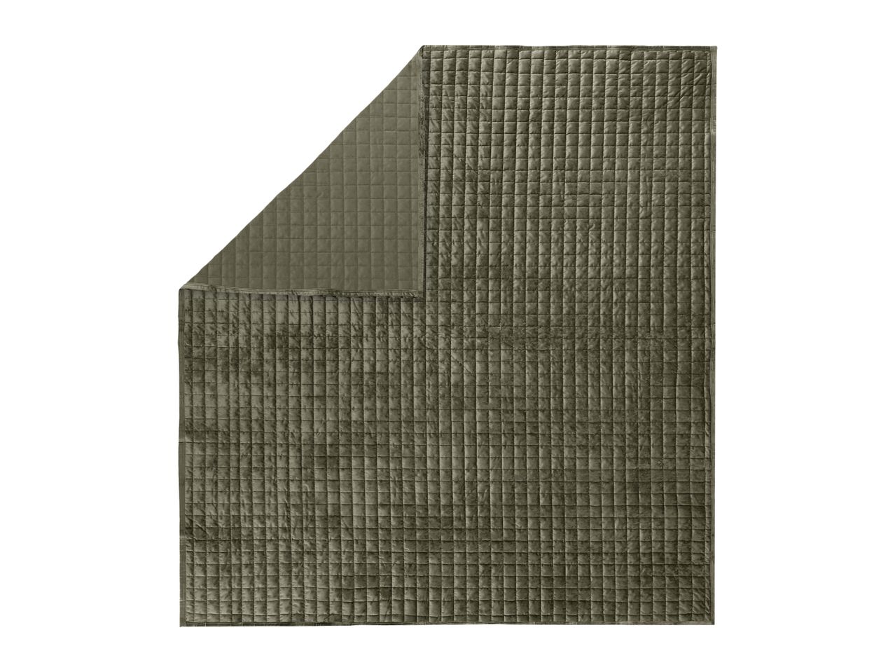Olive green quilted velvet bedspread with a folded corner