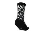 Black and white polka dot patterned sock with size marking on the sole