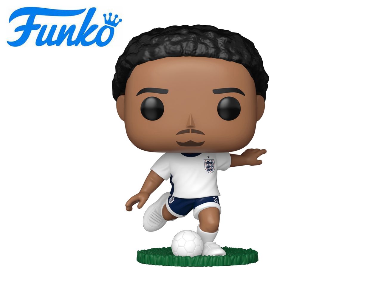 Football player figurine in a white and blue uniform, kicking a white soccer ball.