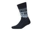 A black sock with a white and gray snowflake pattern and small white dots.
