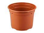 Brown plastic plant pot with a ribbed design, isolated on a white background.