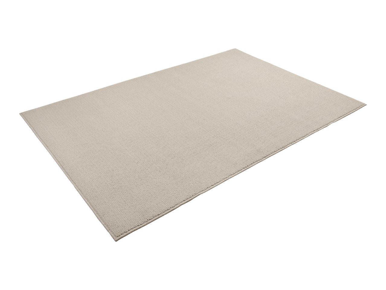 A light beige rectangular rug with a textured surface, viewed from an angle.