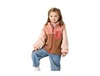 Smiling girl in a color block fleece jacket and blue jeans