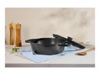 Black cooking pot with lid, wooden salt and pepper grinders, and a wooden spoon.