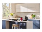 Kitchen counter with a crepe maker, popcorn machine, and sandwich maker, ready for breakfast.