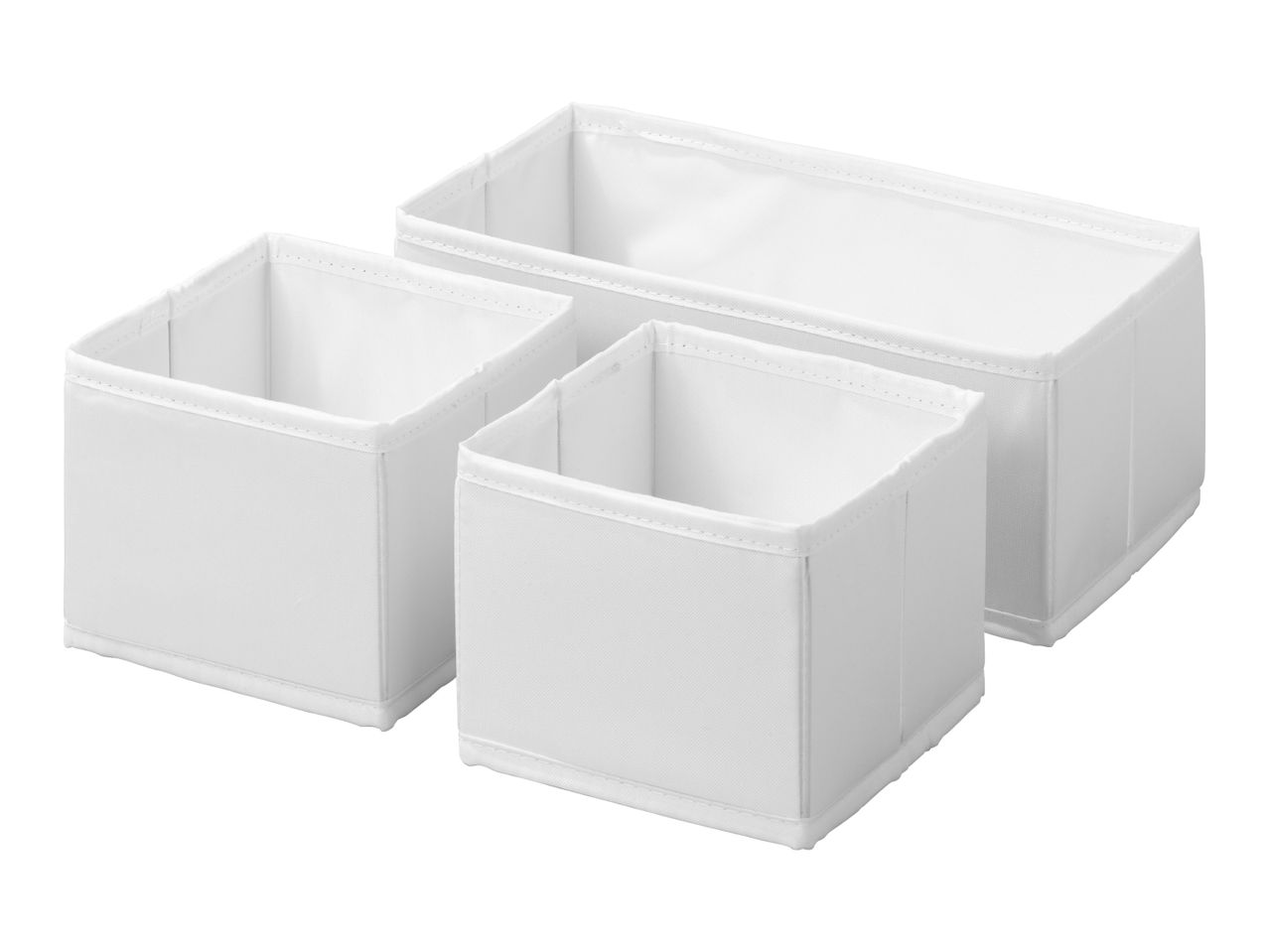 Three white fabric storage boxes, two square and one rectangular, on a white background.