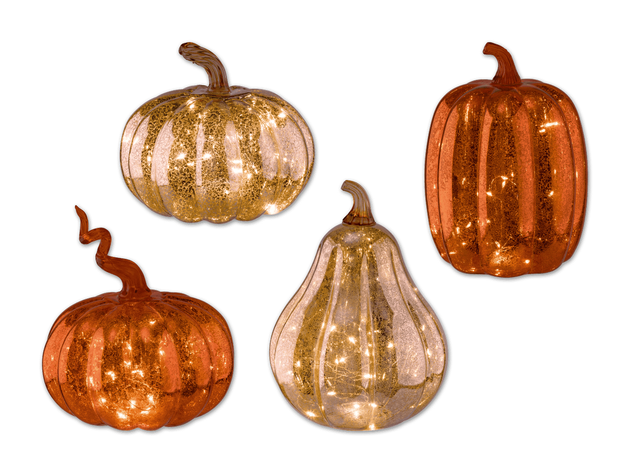 Vier beleuchtete Kürbisse aus Glas in Gold und Orange.