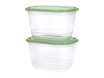 Two clear rectangular food storage containers with light green lids, stacked on top of each other.