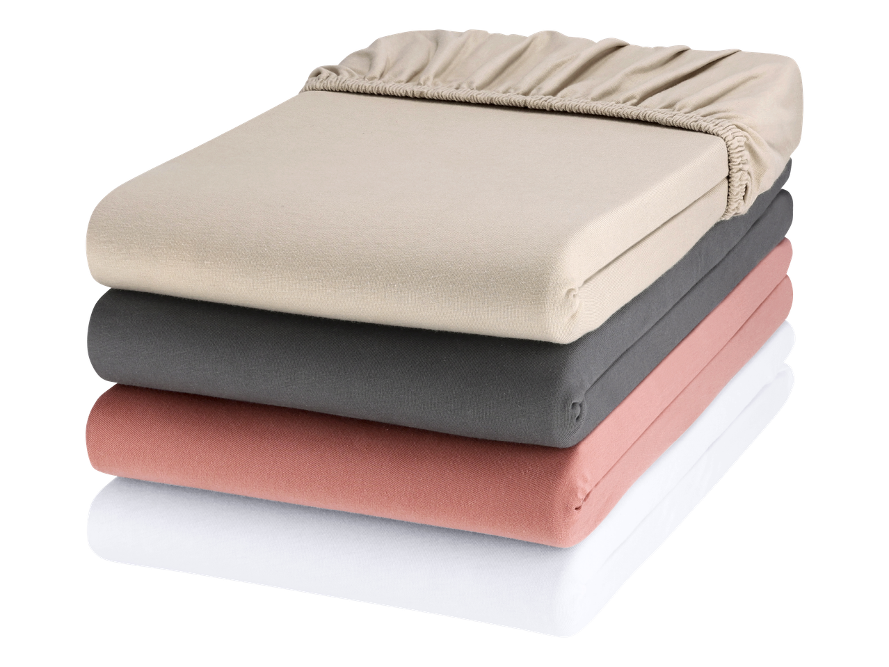 Složene plahte u bež, sivoj, ružičastoj i bijeloj boji.