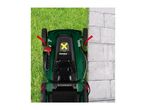 Lawnmower on grass next to a paved path, with arrows indicating edge cutting.