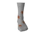 Grey sock with a festive gingerbread man pattern