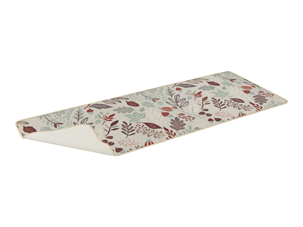 Kitchen runner with a nature-inspired pattern of leaves and acorns in muted colors.
