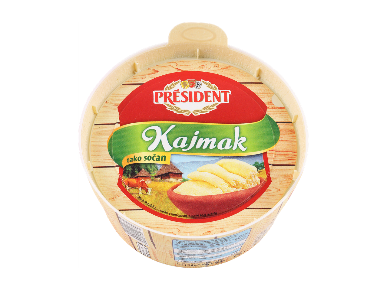 Kajmak v leseni posodi z napisom 'tako sočan' in sliko krave ter podeželske hiše.