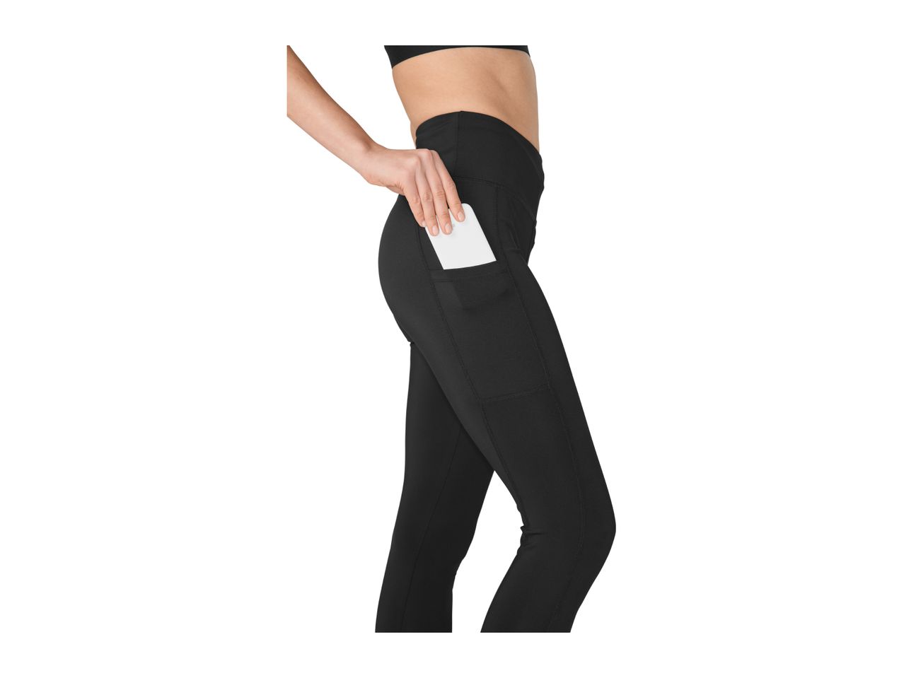 Woman in black leggings with a phone in the side pocket.