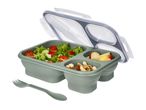 Green collapsible lunch box with salad, nuts, and fruit, with a matching spork.