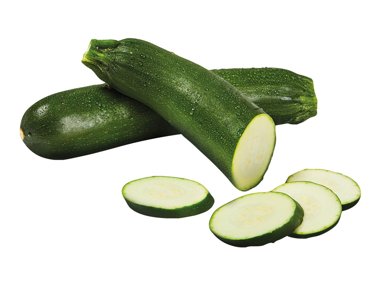 Fresh green zucchini, whole and sliced, on a white background