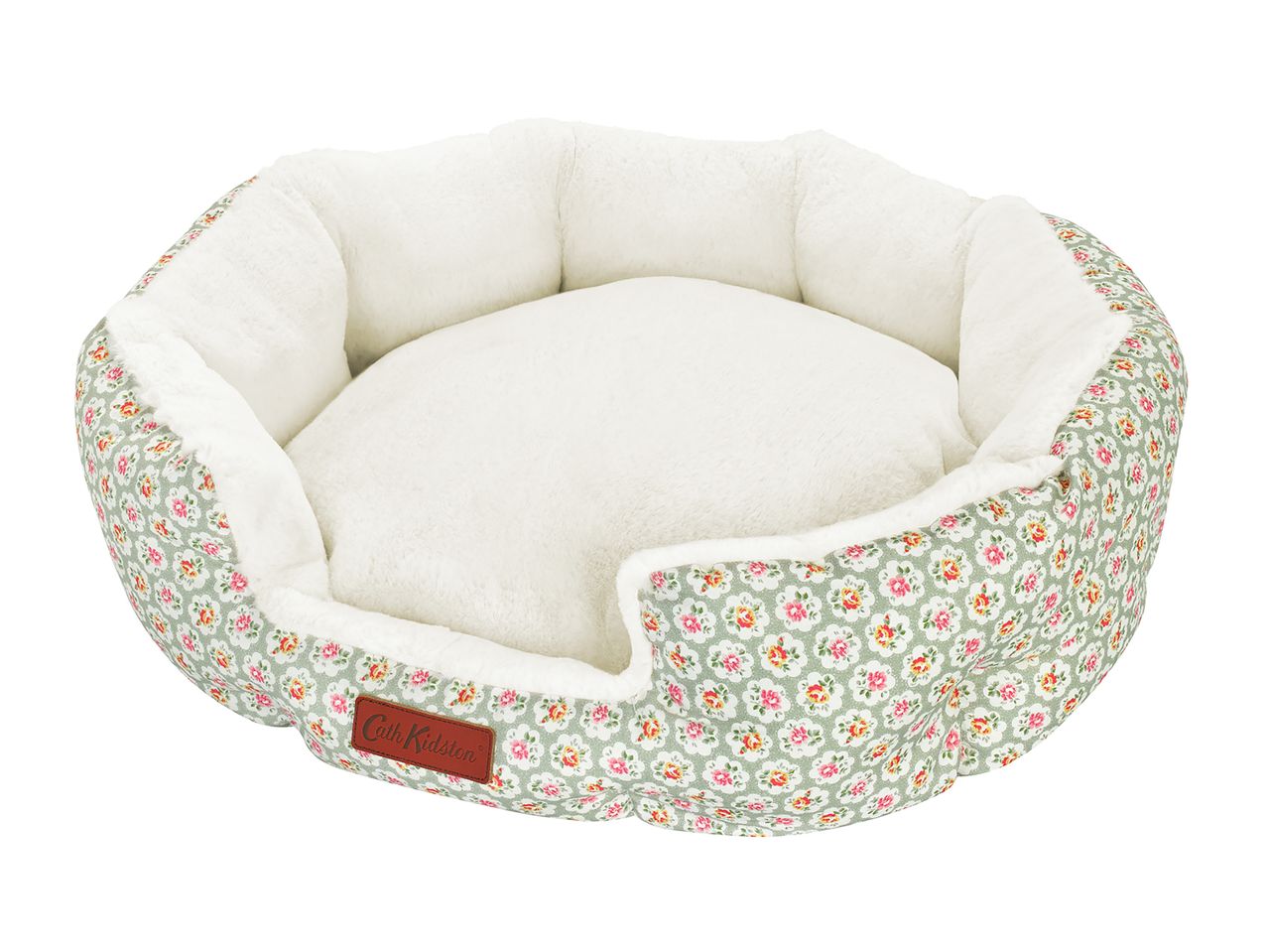 Cath Kidston pet bed in a sage green floral print with a cream faux fur interior.