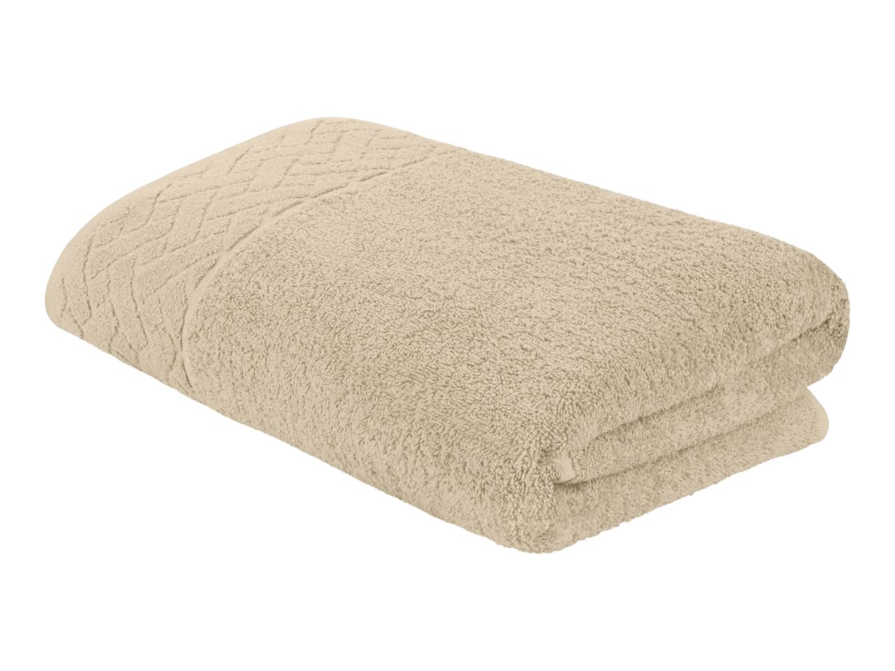 A beige bath towel folded neatly.