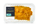 Pangasiusfilet in kerriesaus in een plastic schaaltje.