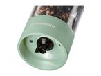 Electric pepper grinder with mixed peppercorns, featuring a light green base and an illuminated grinding mechanism.