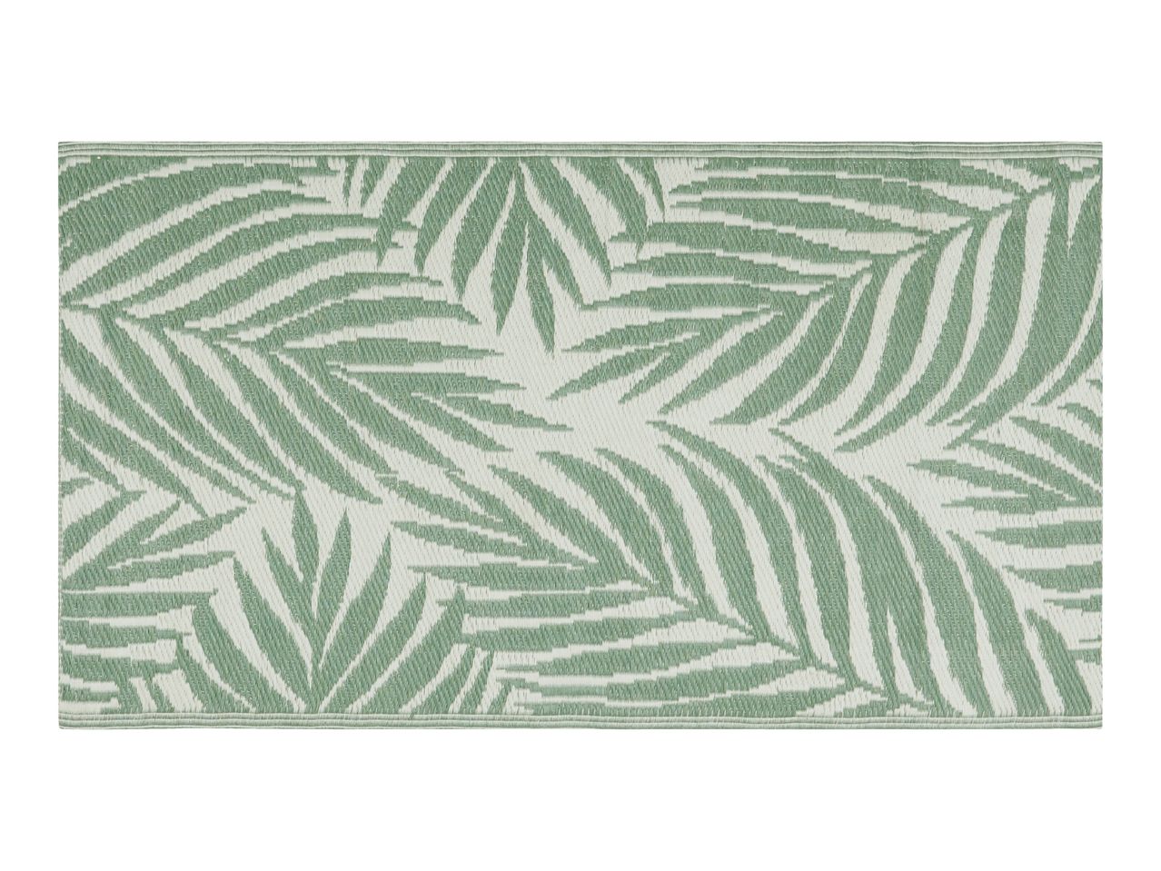 Green and white outdoor rug with a palm leaf pattern.