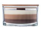 Layered candle in a glass jar with a wooden lid, featuring white, light brown, and dark brown wax.