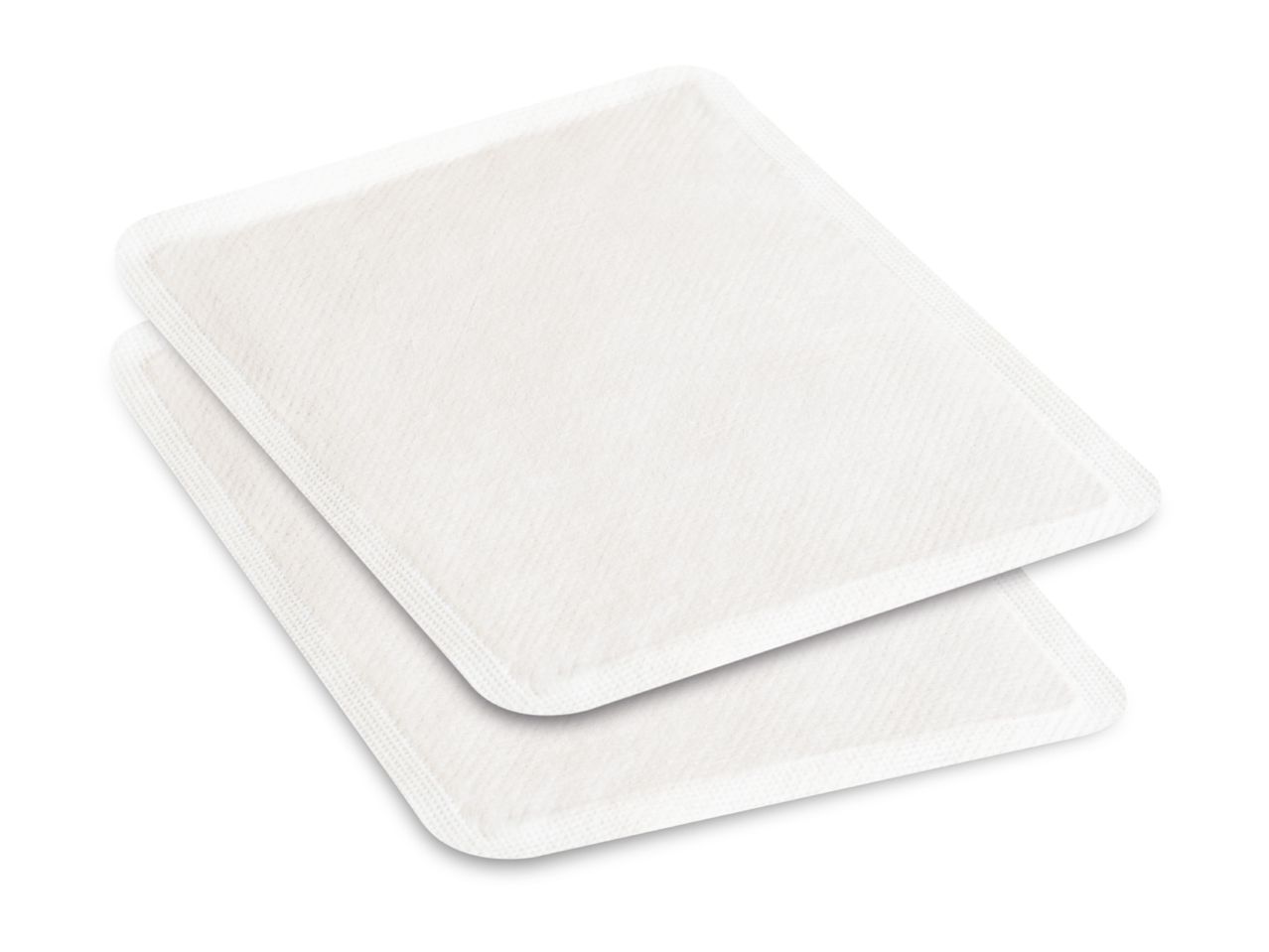Two white rectangular heat pads with rounded corners