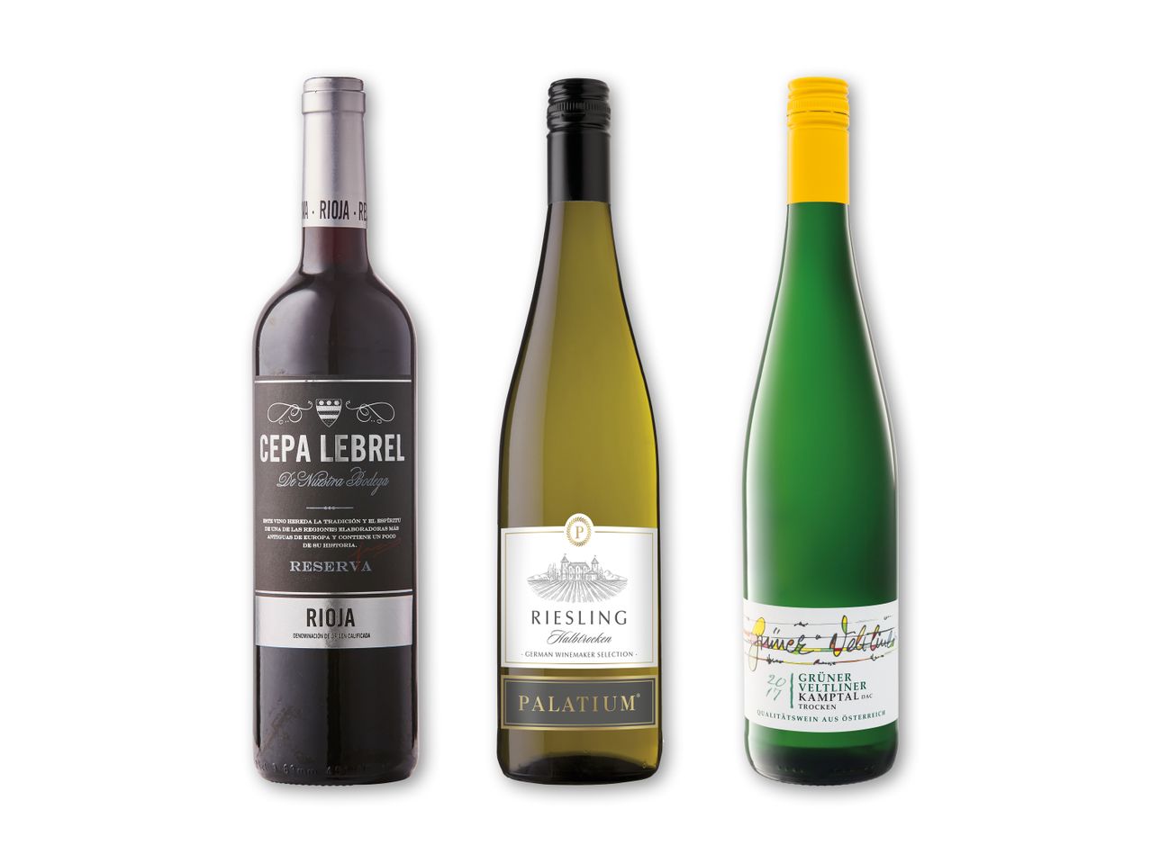 Tre flasker vin, herunder en rød Rioja, en hvid Riesling og en grøn Grüner Veltliner.