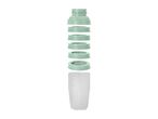 Collapsible light green funnel and stack of clear plastic measuring cups.