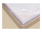 White mattress with a removable quilted cover zipped open to show the foam layer inside
