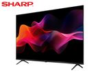 A large flat-screen television with a colorful abstract image on the screen.