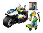 A police officer on a motorcycle chasing a robber on a skateboard with money, near an ATM.