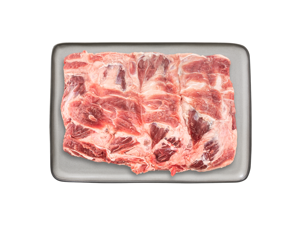 Švieži jautienos šonkauliai pilkame padėkle, vaizdas iš viršaus.