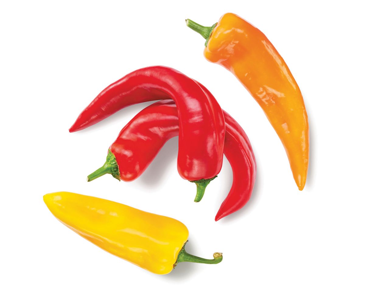 Red and yellow peppers isolated on white background.
