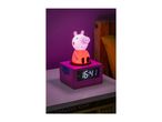 Peppa Pig night light and alarm clock on a bedside table.