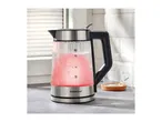 SilverCrest glass kettle with red illuminated boiling water on a kitchen counter