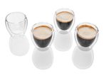 Four double-walled glass espresso cups and one empty cup.