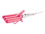Pink triple barrel curling iron for creating voluminous curls and waves.