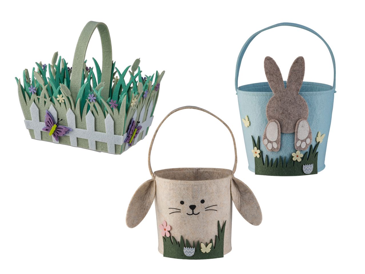 Drei Osterkörbe aus Filz: ein rechteckiger mit Zaun und Schmetterlingen, ein runder mit Hasengesicht und ein blauer mit Hasenrücken.