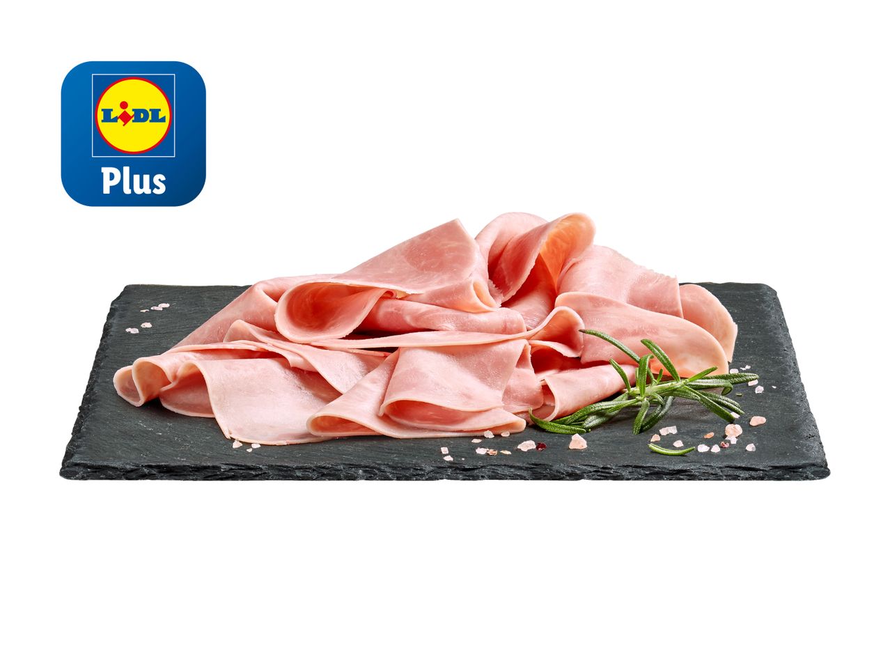 Lidl Plus Schinkenscheiben auf einer Schieferplatte mit Rosmarin.