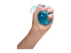 A hand squeezes a blue stress ball.