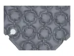 Close-up of a grey inflatable sleeping mat with a white valve