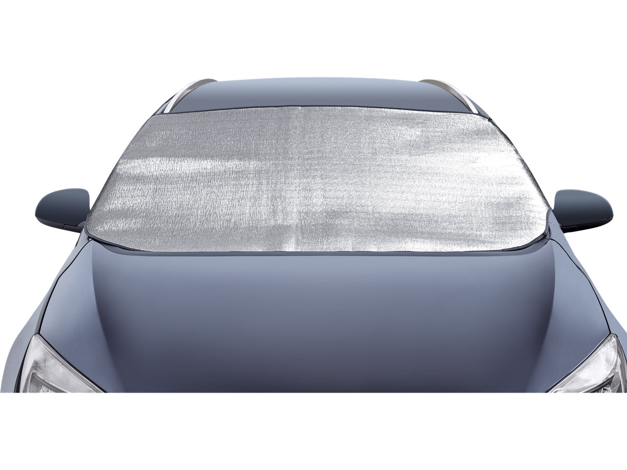 Car windshield covered with a silver sunshade.