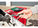A mechanic uses a Parksider ratchet and tool set to repair a car.